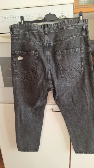 Jeans uomo grigi strappati taglia 48