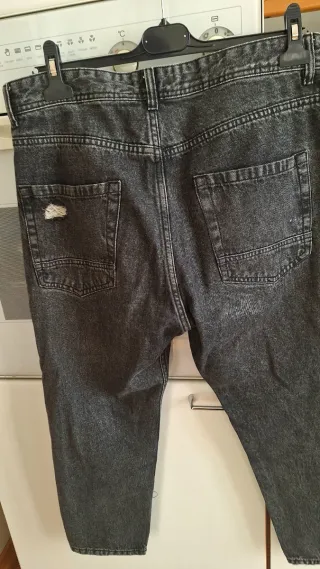 Jeans uomo grigi strappati taglia 48