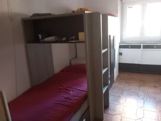 Cama tren con armario y cajón