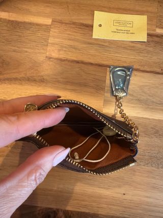 Portamonete con ciondolo Louis Vuitton Marrone