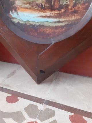 Antichi quadri con piatti e cornice in legno