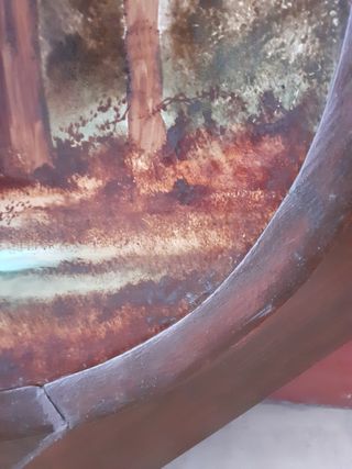 Antichi quadri con piatti e cornice in legno