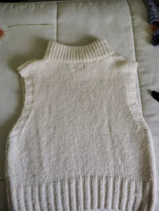 Chaleco de punto cuello alto sin mangas