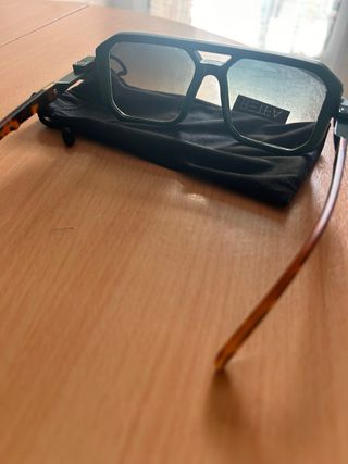 Gafas de sol verdes degradadas