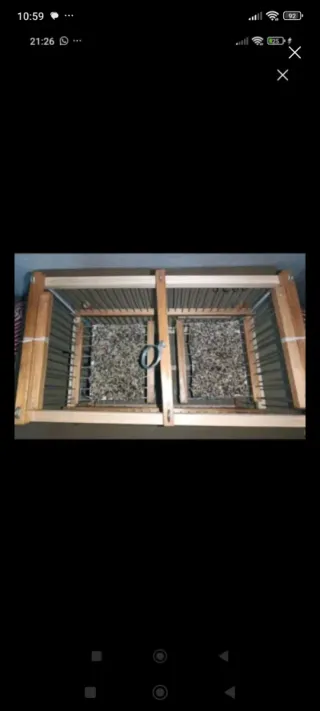 Jaula para pájaros de madera natural