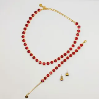Parure acciaio dorato Swarovski rubino