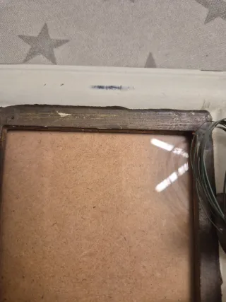 Cornice portafoto decorato con fiori