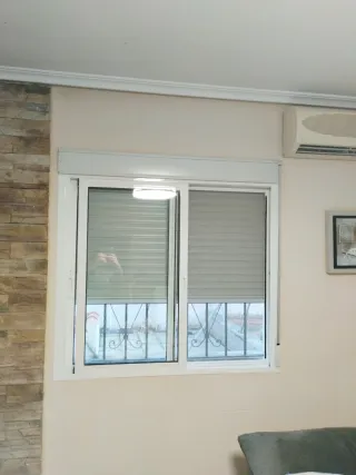 2 Ventana corredera con persiana climalit