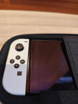 Nintendo Switch Oled B/N con accesorios y juegos