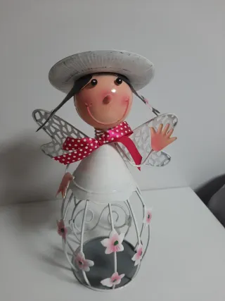 Muñeca de hojalata decorativa