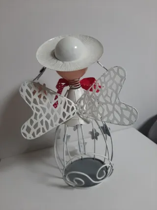 Muñeca de hojalata decorativa