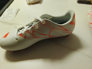 Zapatillas Puma niño blancas y naranjas