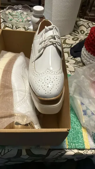 Scarpe bianche con piattaforma