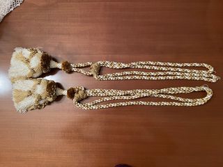 Coppia di fermatende con nappe