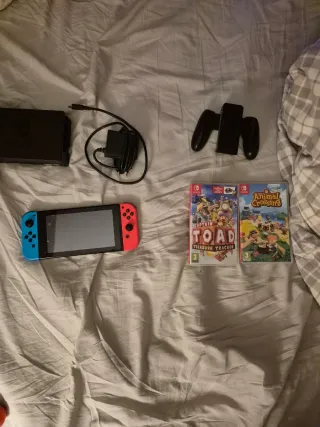 Nintendo Switch + 2 giochi + accessori