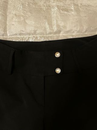 Pantaloni neri a gamba ampia