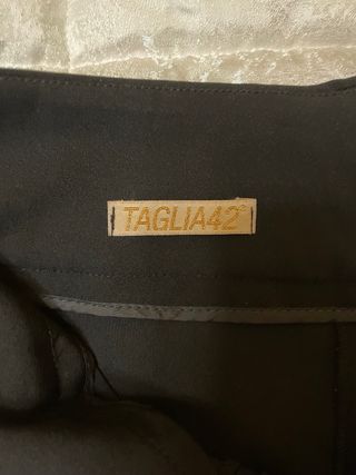 Pantaloni neri a gamba ampia