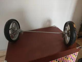 Cochecito de muñecas con capazo.