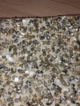 Bolso de mano lentejuelas dorado y plateado