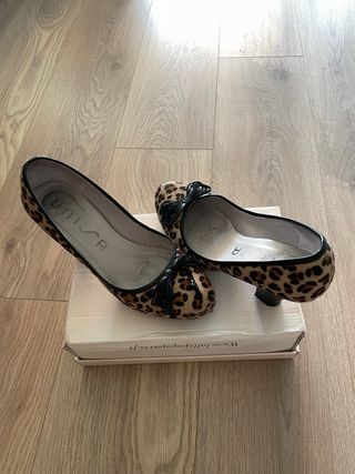 Scarpe UNISA leopardo con fiocco