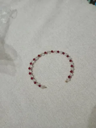 Bracciale con perline rosse e oro