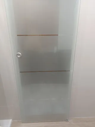 Puerta corredera de cristal