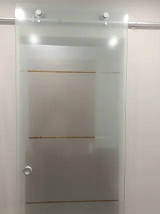 Puerta corredera de cristal