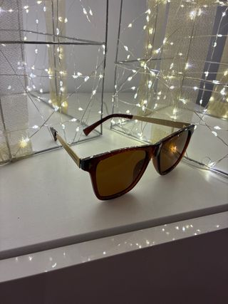 Gafas de sol Hawkers marrones y doradas