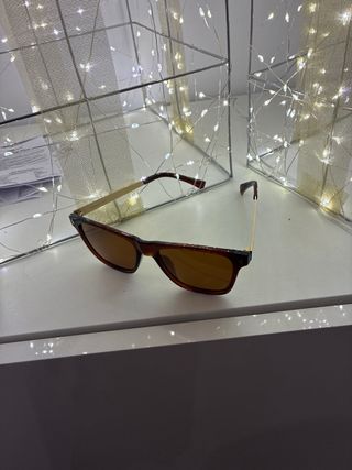 Gafas de sol Hawkers marrones y doradas