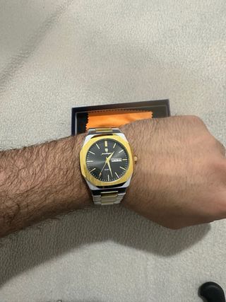 Reloj POEDAGAR Oro y Plata
