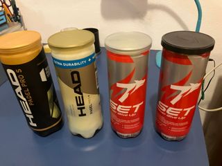 4 botes pelotas pádel Head y Set