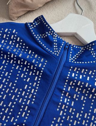 Conjunto 2 piezas top y falda flecos y piedras