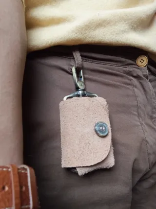 Bolso llavero para auriculares o mecheros