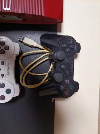 Console PS3 rossa + controller e cavi
