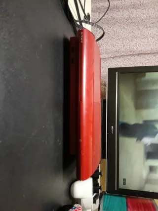 Console PS3 rossa + controller e cavi