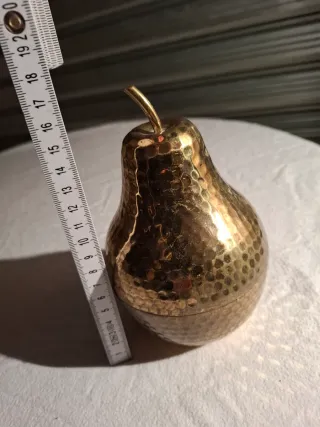 Antica pera in ottone