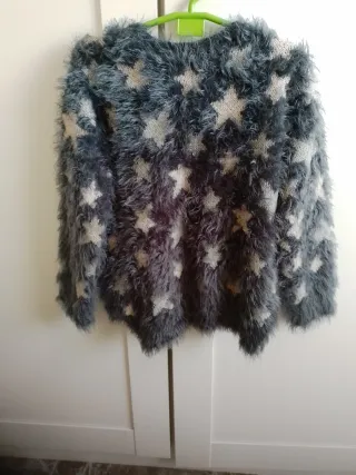 Jersey navideño Benneton, niña estrellas talla 6-7