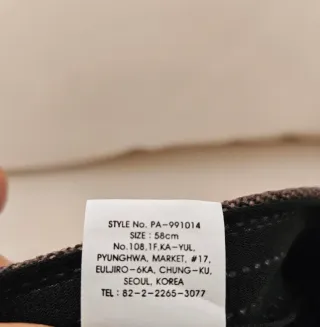 Berretto a becco d'oca marrone e grigio