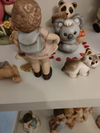 Statuina bambina Goebel con cartella