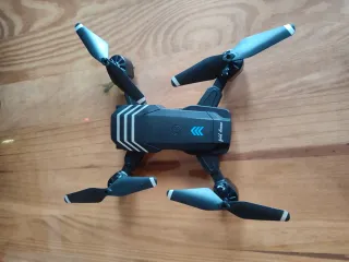 Dron plegable negro con mando y 3 baterías