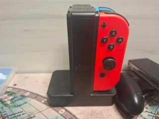 Nintendo Switch + 4 controller + 4 giochi + caricabatterie