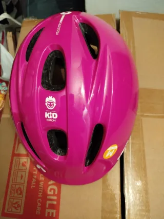 Casco de bici rosa infantil