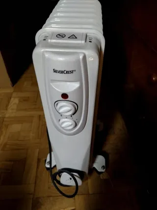 Radiador eléctrico blanco y beige