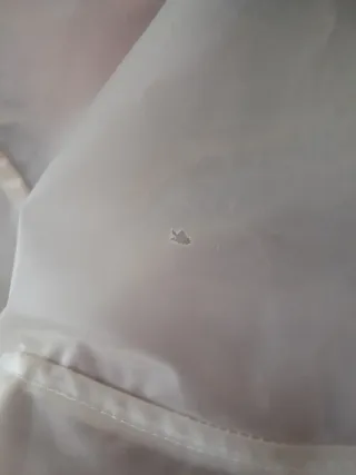 Chubasquero transparente beige