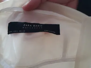 Chubasquero transparente beige