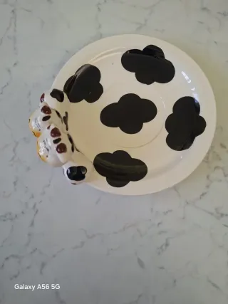 Tazza e piattino in porcellana a tema mucca