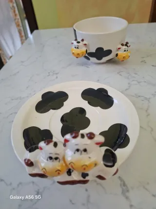 Tazza e piattino in porcellana a tema mucca