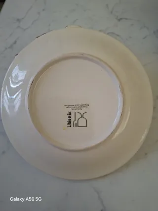 Tazza e piattino in porcellana a tema mucca