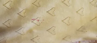 Cardigan bambina giallo con cuori