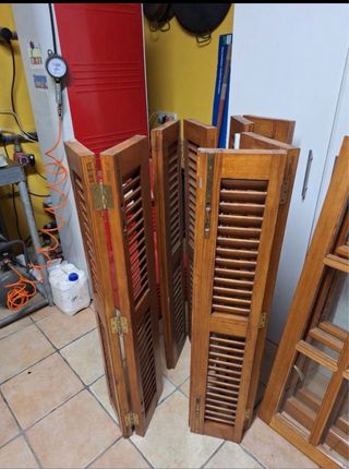 Persianas de madera y cristaleras
